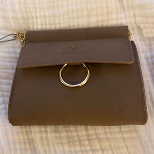 Vanessa Williams suede clutch